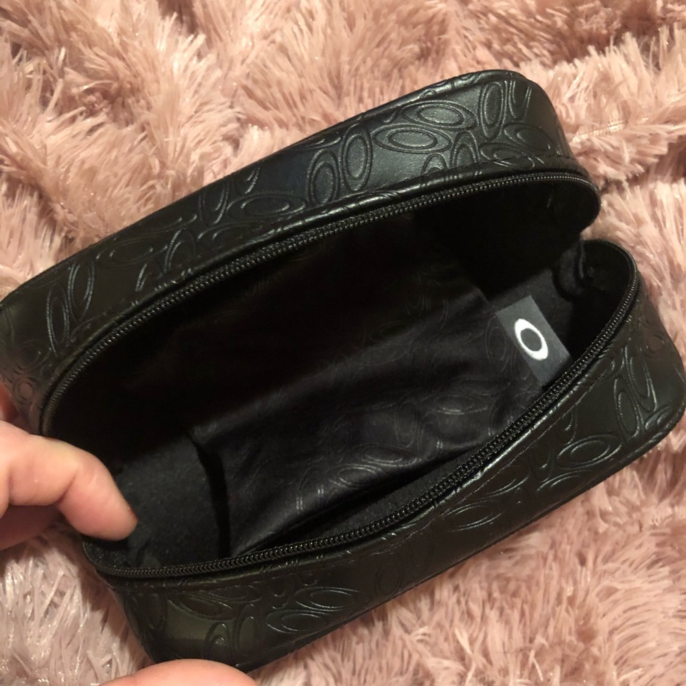 Brand new Oakley glasses case with wrist strap!